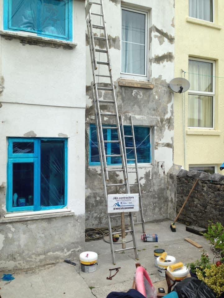Render repair work in Porthleven